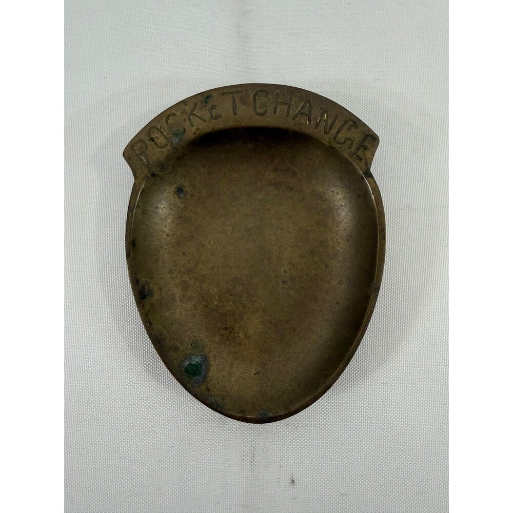 vintage solid brass "Pocket Change" catchall tray with a slight patina